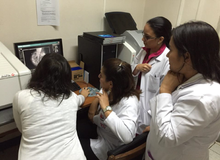 teaching residents and staff at Hospital Bautista