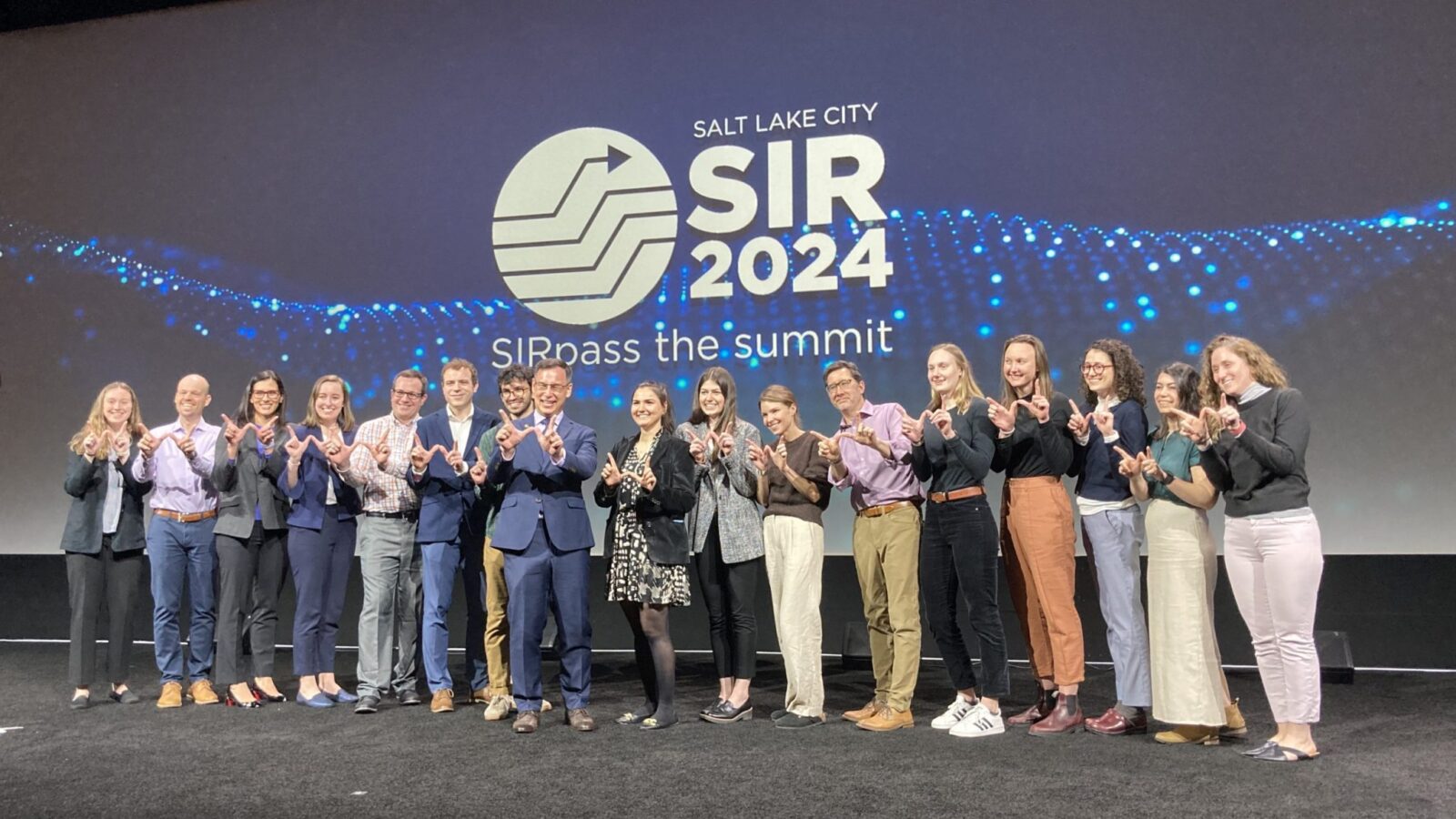 Dr. Lee invited colleagues to join him onstage during the SIR Gold Medal acceptance ceremony.