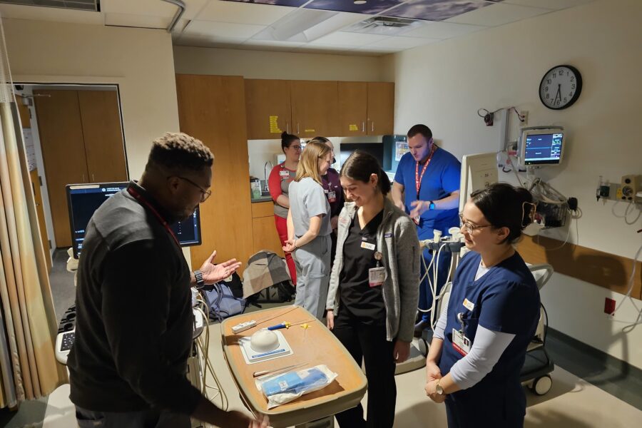 Lewis Jordan, MD, MPH, MS and Thomas LoDuca, MD explaining procedures to medical students.