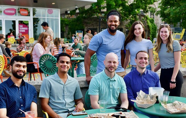 A group of residents pose for a photo at the UW–Madison Memorial Union.