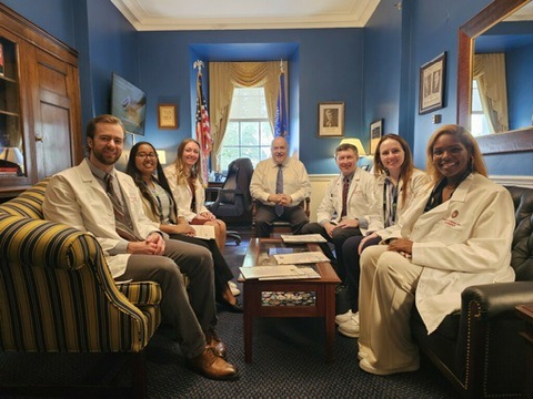 Pictured from left to right: resident Erik Winterholler, MD; PhD student in the Department of Medical Physics Srijyotsna (Lucky) Volety, MS; former Musculoskeletal Imaging & Intervention fellow and resident Karla Wetley, MD; Rep. Pocan; Robert Bour, MD; resident Erin Sullivan, MD; and Jade Anderson, MD.