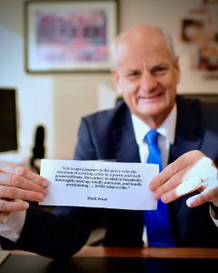 Dr. Grist with the Mark Frost quote he attached to his monitor.