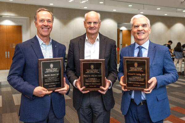 Thomas Grist (middle) poses with his fellow Folkert. O Belzer award recipients Paul Harari (left) and Howard Bailey (right). Photo courtesy of SMPH Media Solutions.