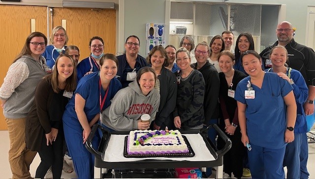 Kelly Bybee celebrated her upcoming retirement with coworkers, who surprised her with a cake.