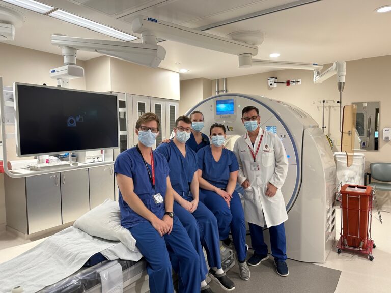 The new scanner is shown here, along with some of the members of the research team, including Trevor Everett, MD (an Abdominal Imaging Fellow), Kelsey Schluter (CT technologist), Marcia Foltz (CT procedure nurse), and Fred Lee, Jr., MD. (Photo credits: Fred Lee, Jr., MD).