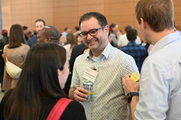 faculty member talking to one another