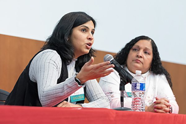 Pallavi Tiwari, PhD speaking during the panel at the GWIMS symposium.