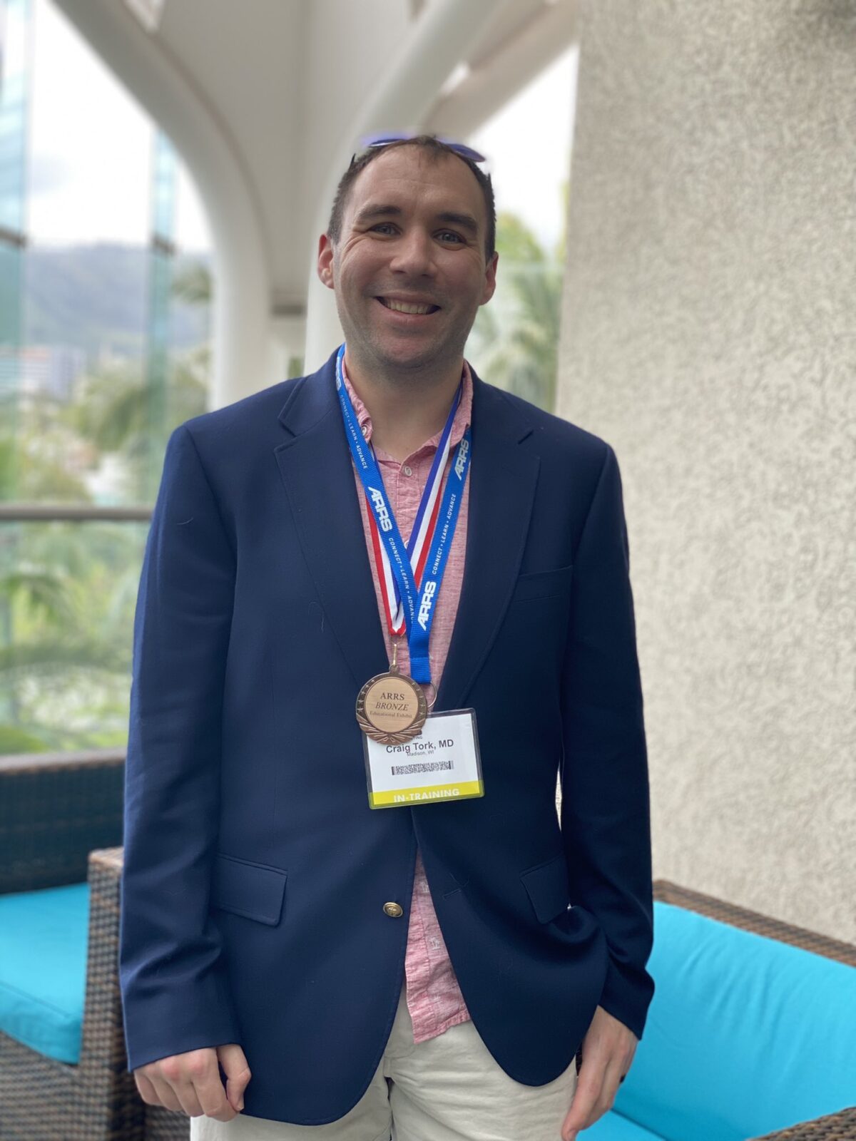 Craig Tork, MD after receiving the Bronze Medal for his educational exhibit. (Photo courtesy of @UWiscNeuroRad)